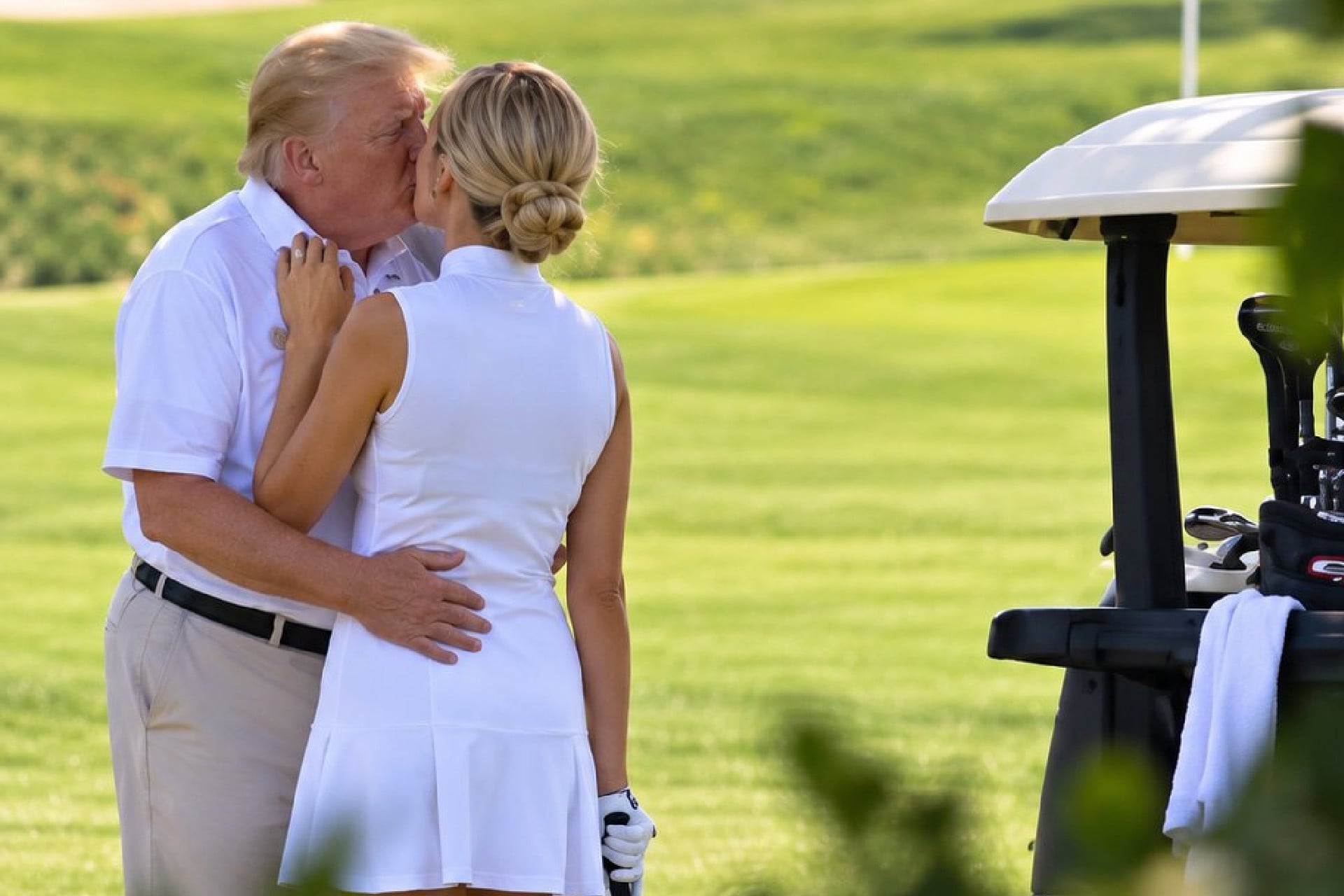 AI image of President Donald Trump kissing Natalie Harp on a golf course.