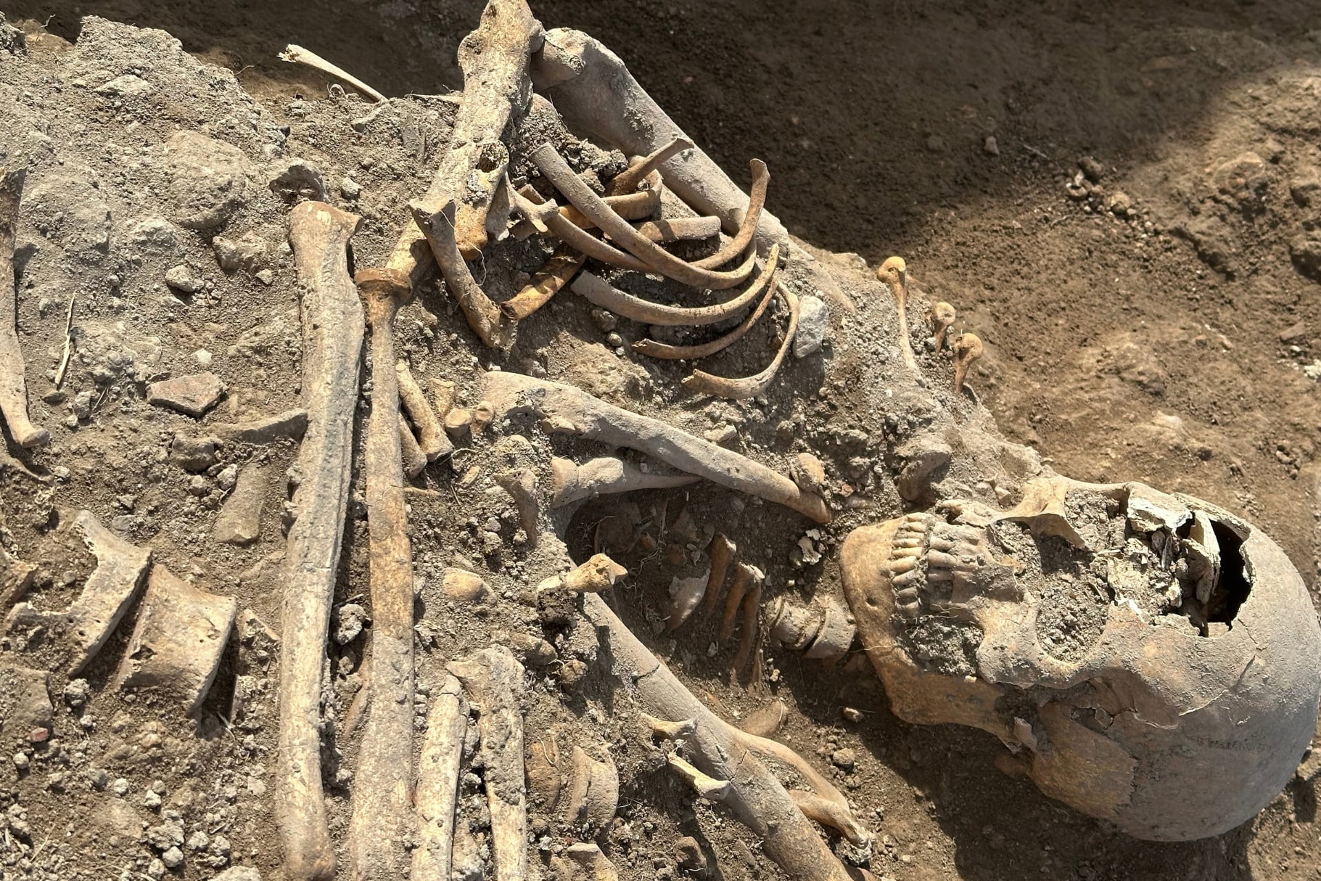 The woman and child were unearthed in a medieval cemetery.