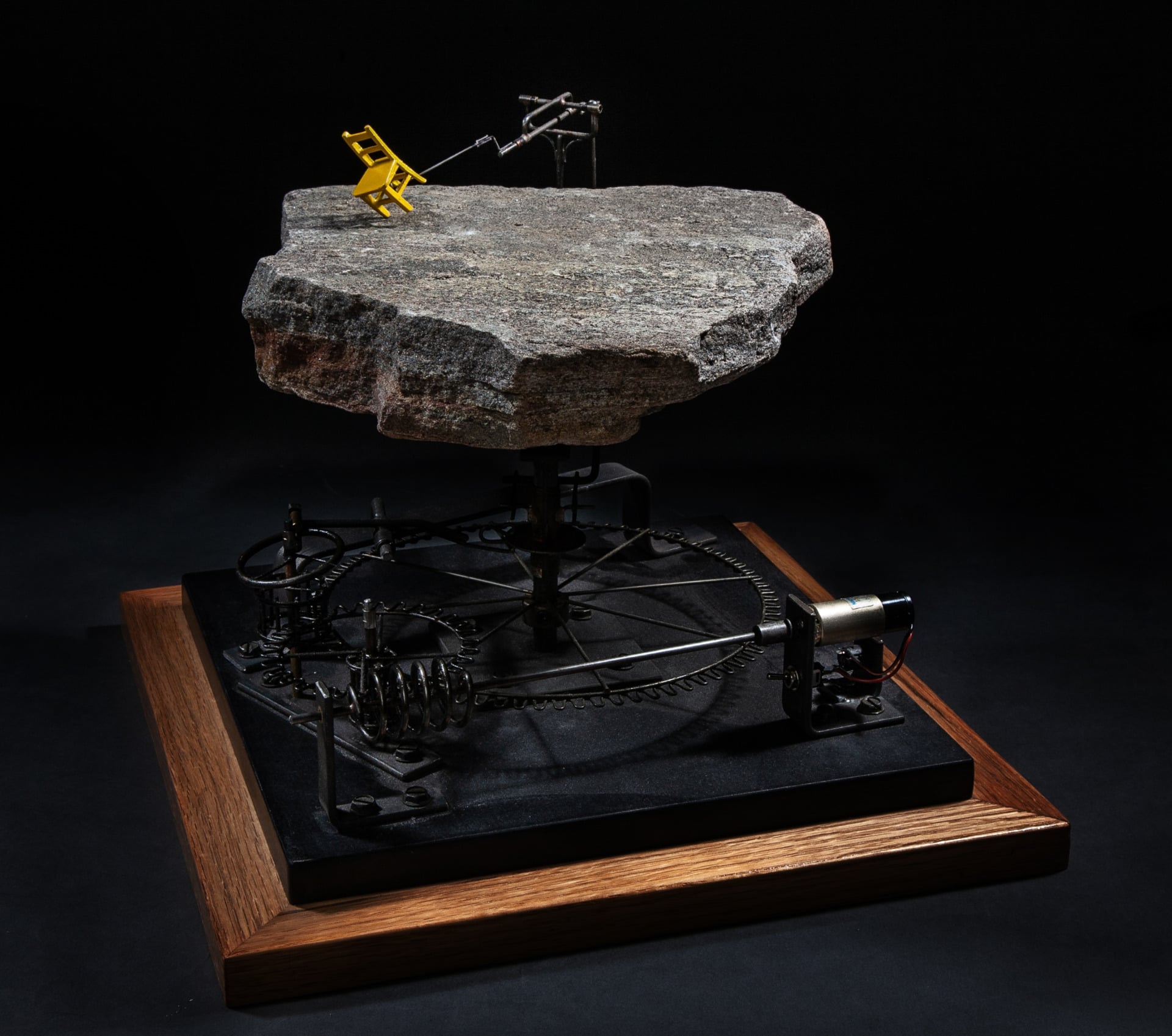 Arthur Ganson's yellow chair art piece