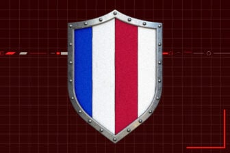 An image of a worn shield with stripes in the colors of the American flag.