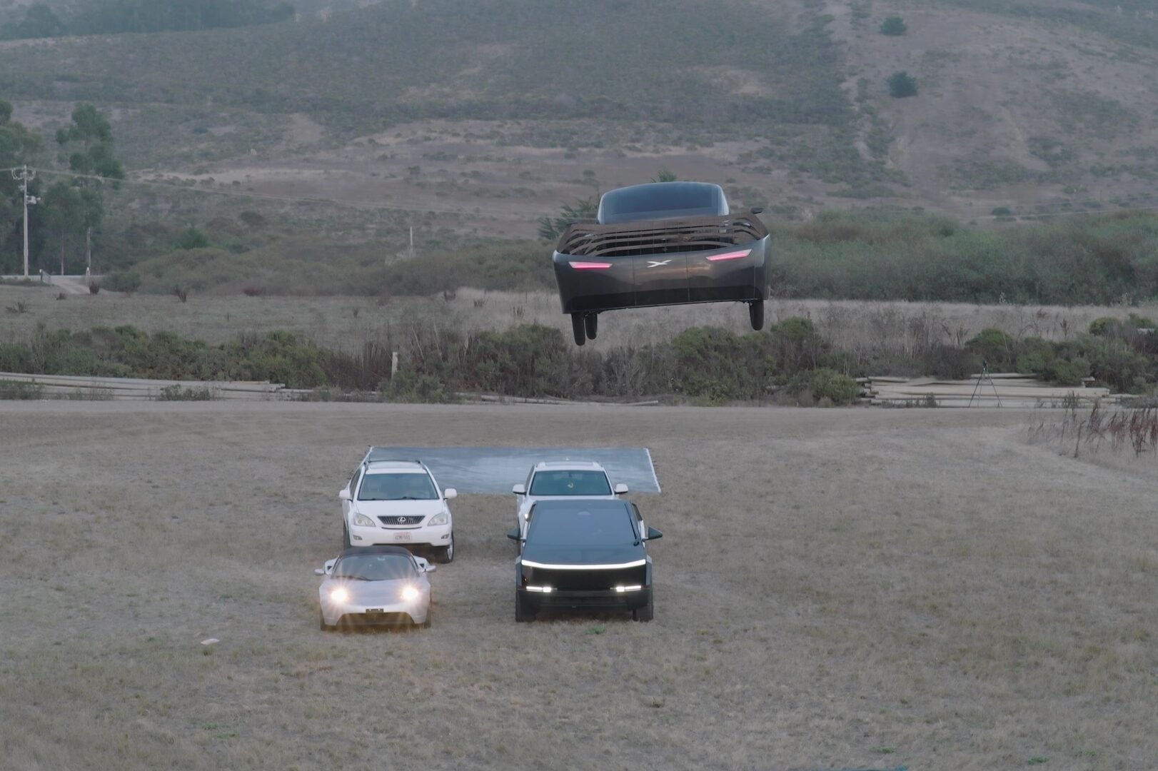 Alef car flying Over Multiple Cars Including Tesla Roadster Cybertruck