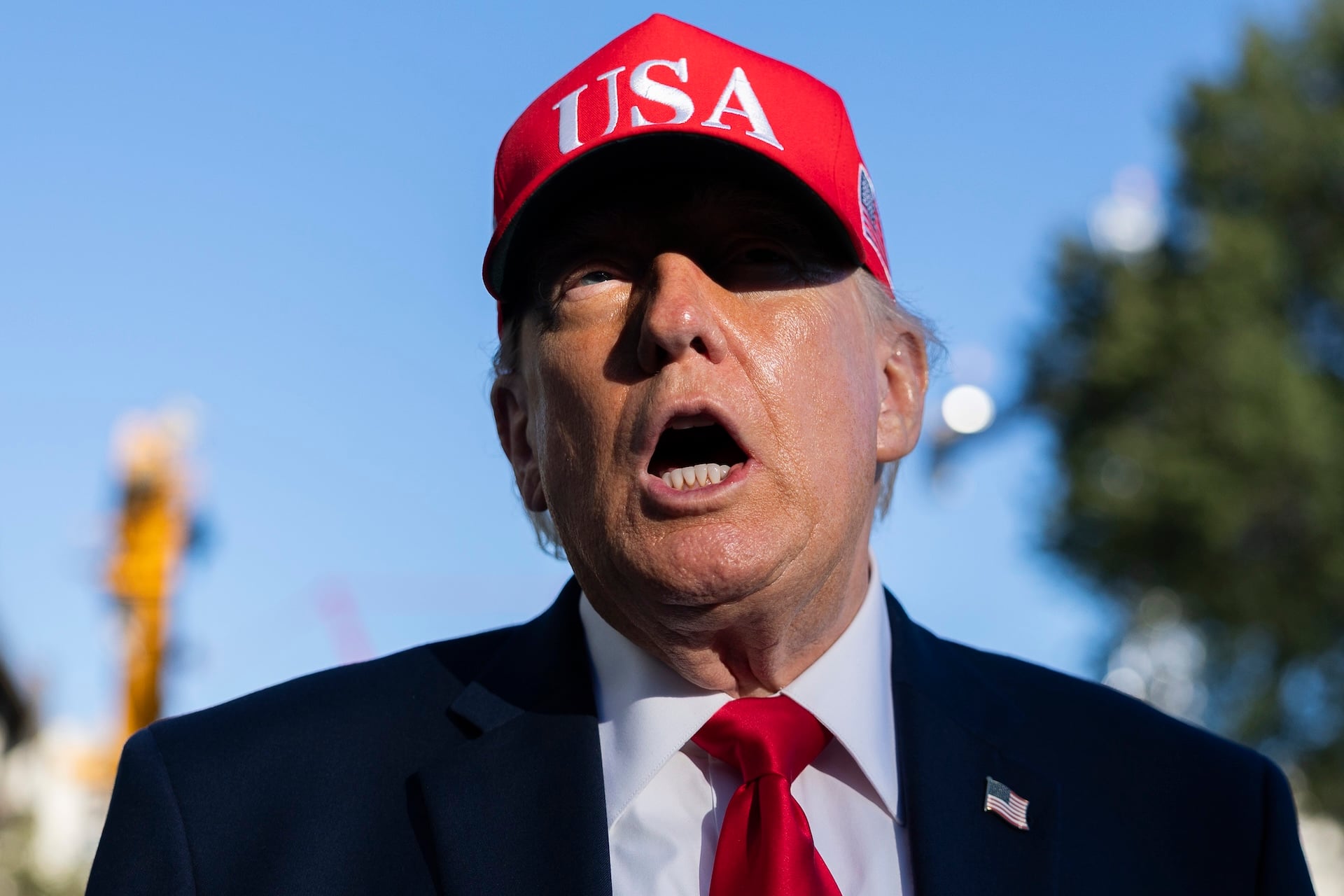 U.S. President Donald Trump speaks to the media on the South Lawn as he returns to the White House on October 06, 2026 in Washington, DC. 
