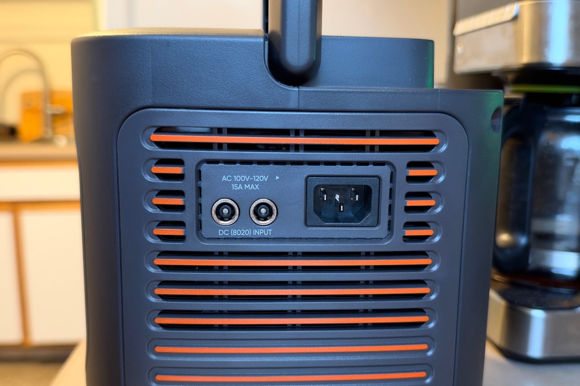 Picture of the side of the HomePower 1000 Plus v2's side, including its DC ports and power input port.