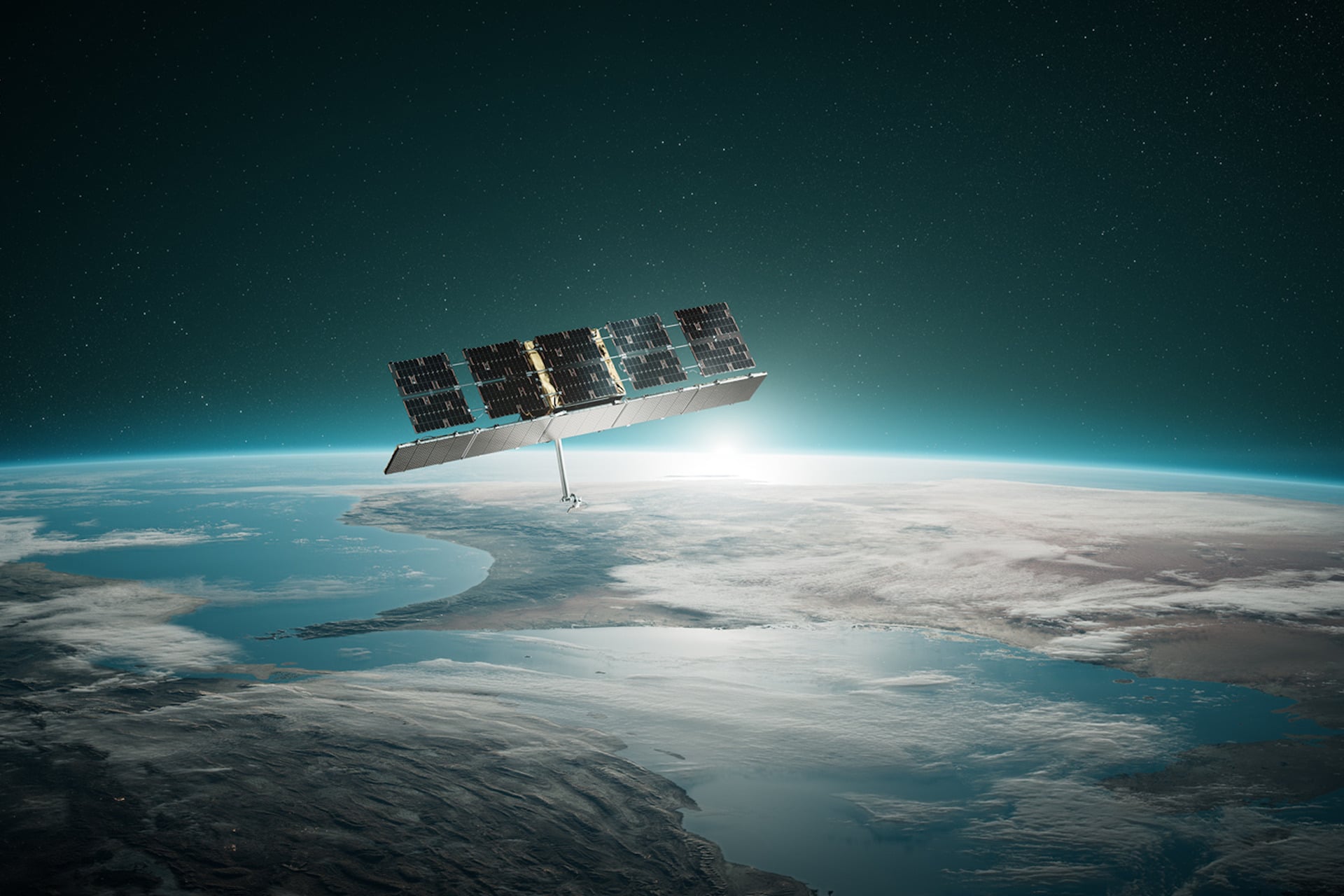 An illustration of an ICEYE satellite in Earth orbit.