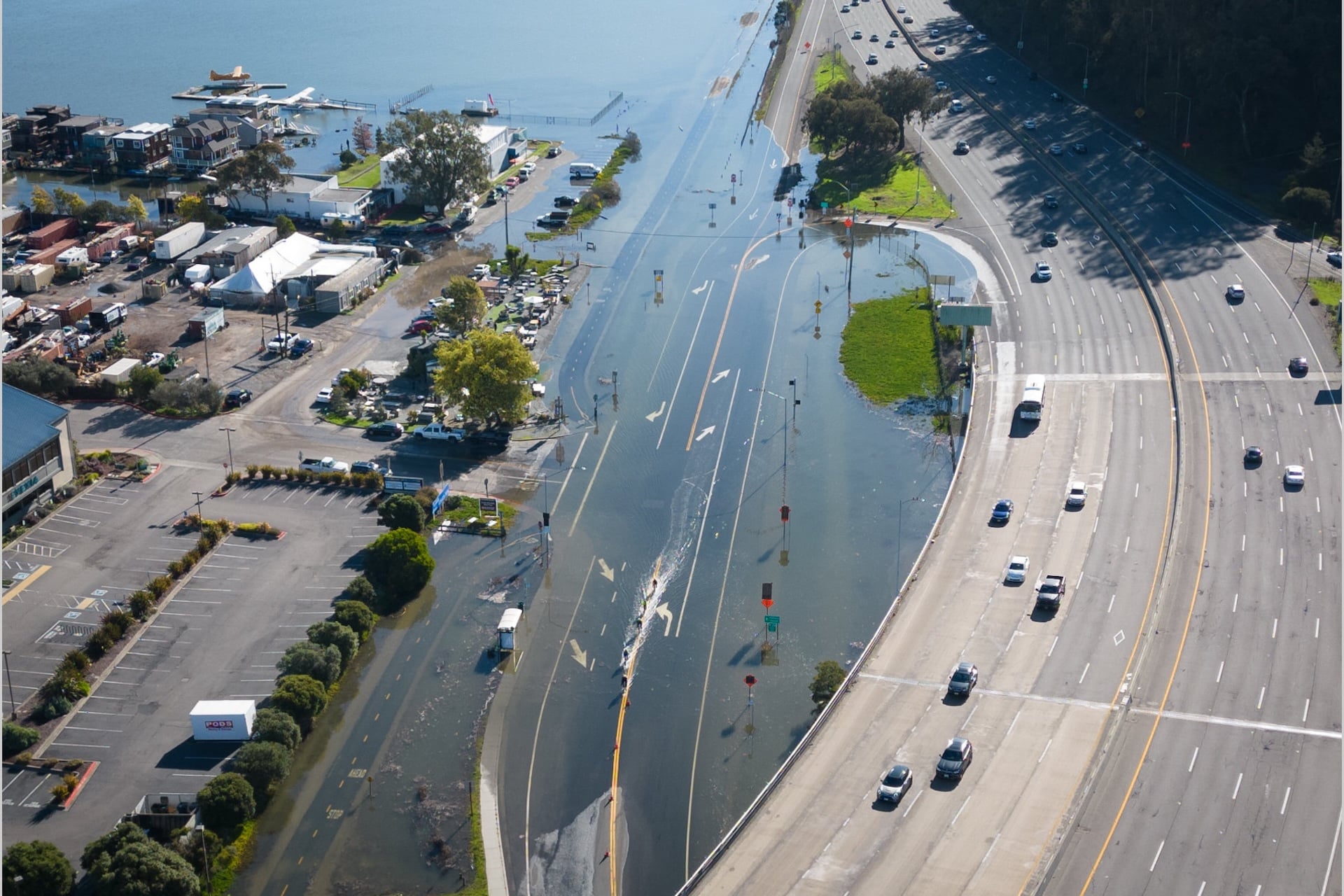 A mere monthly high tide caused flooding across the Bay Area this week, reminiscent of the annual “king tide” season, seen here flooding Sausalito’s Highway 101 on-ramp back in 2023.