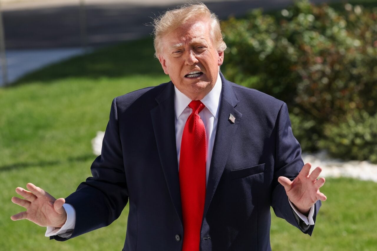 U.S. President Donald Trump gestures after speaking to the media as he departs the White House on October 01, 2026 in Washington, DC.