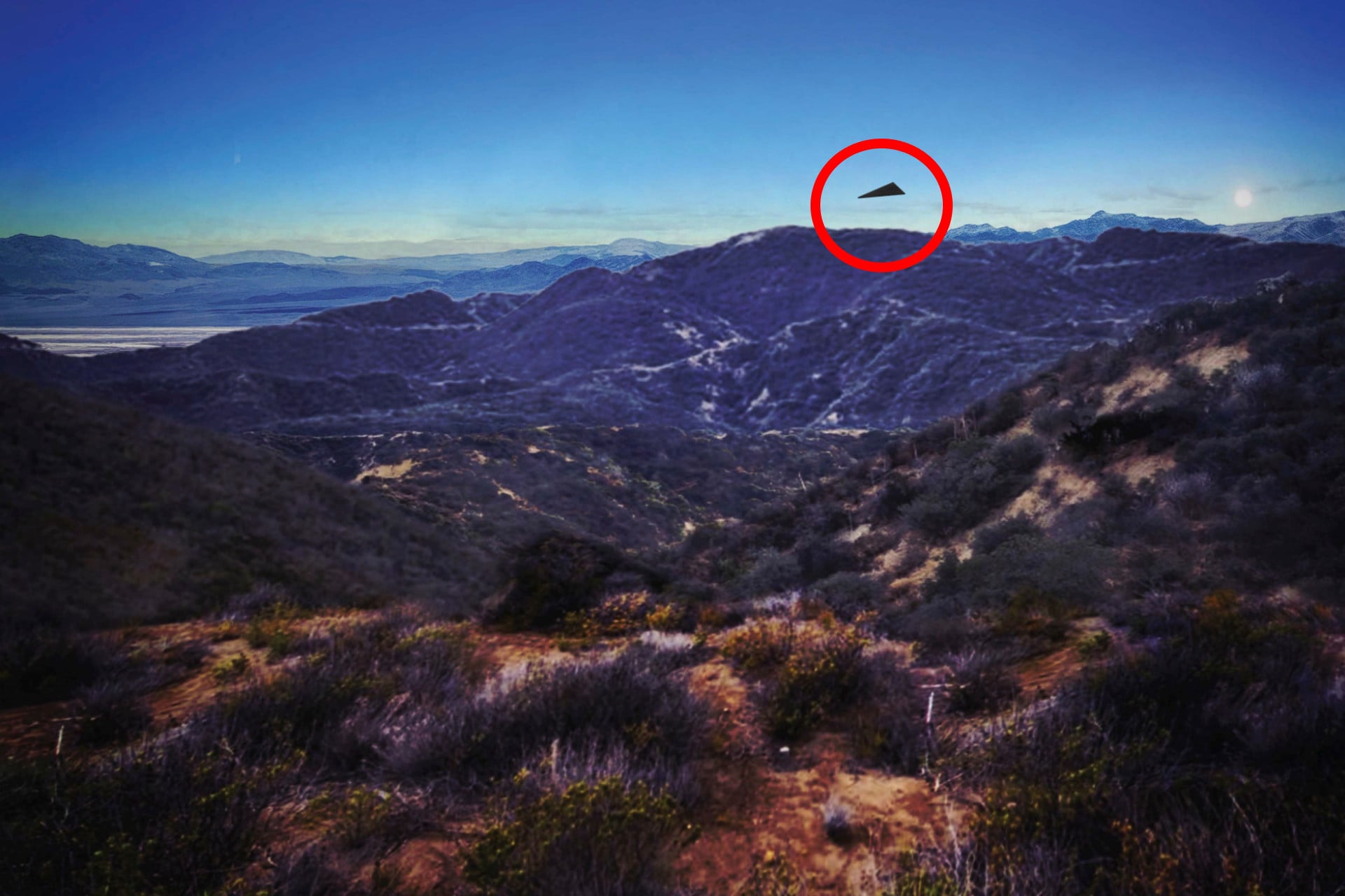 A visual representation of an unidentified flying object released by the FBI on Oct. 23, 2026, with a red circle annotation by Gizmodo