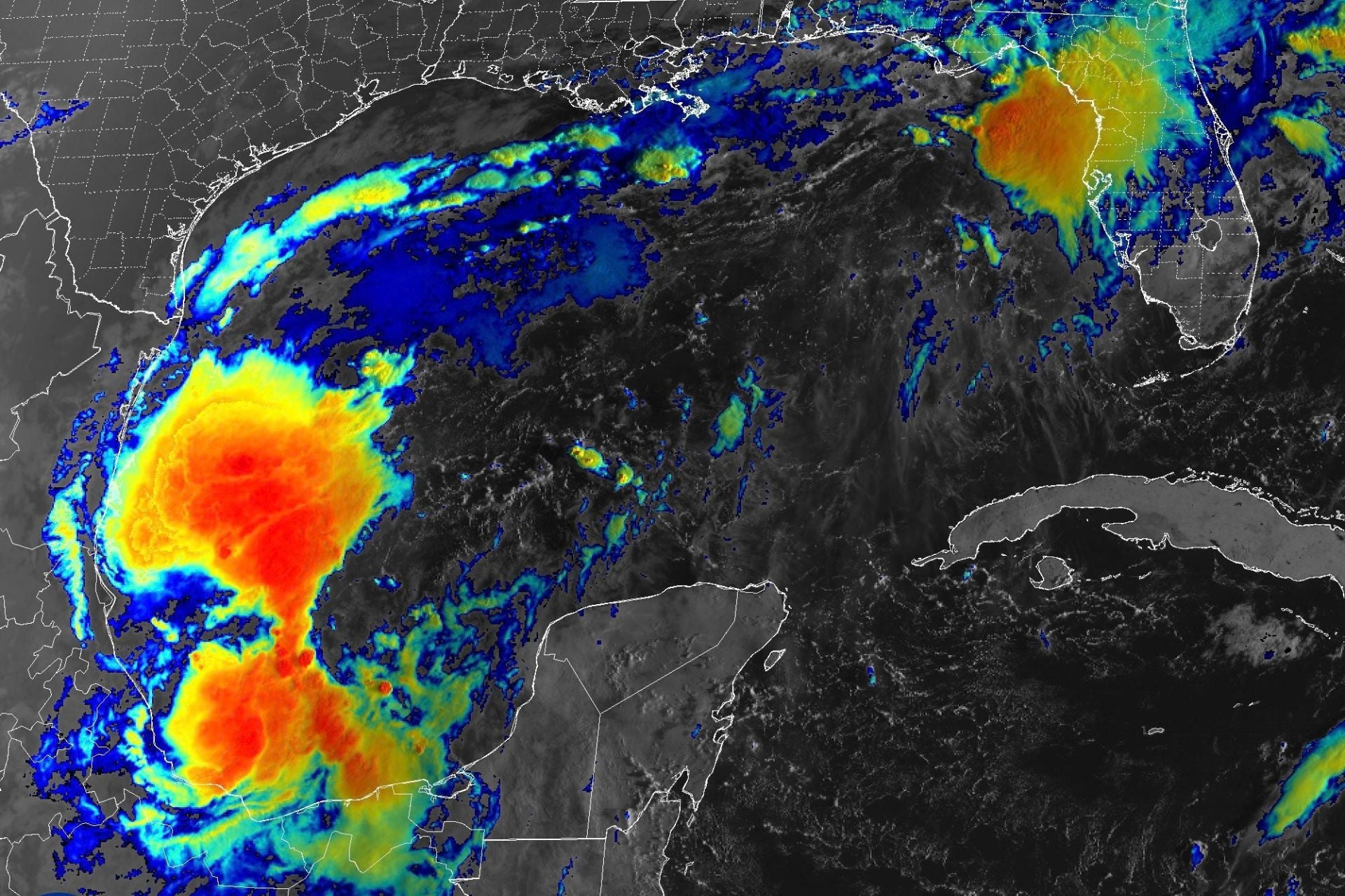 This satellite image taken October 6, 2026, shows a large storm system in the southwestern Gulf of Mexico with a 90% chance of cyclone formation in the next 48 hours.