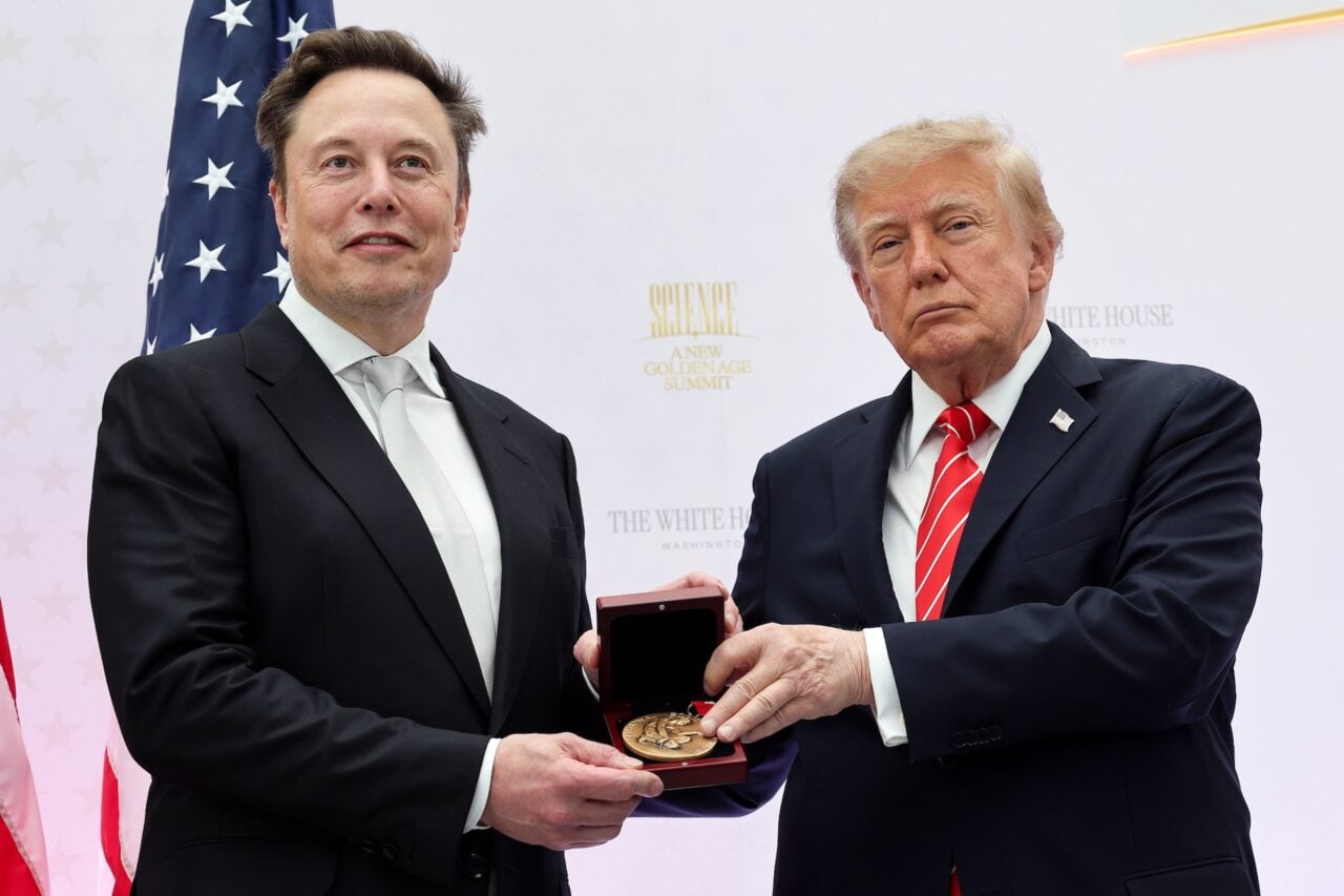 Tesla and SpaceX CEO Elon Musk (L) receives the National Medal of Science from U.S. President Donald Trump during the Golden Age of American Innovation Summit at the Institute of Peace on October 08, 2026 in Washington, DC.