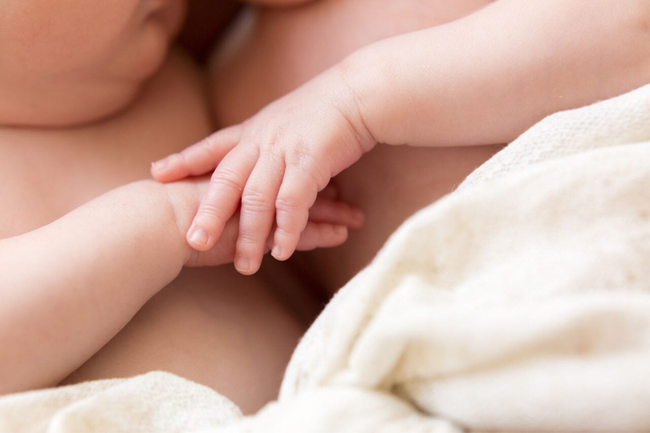 Twins Holding Hands